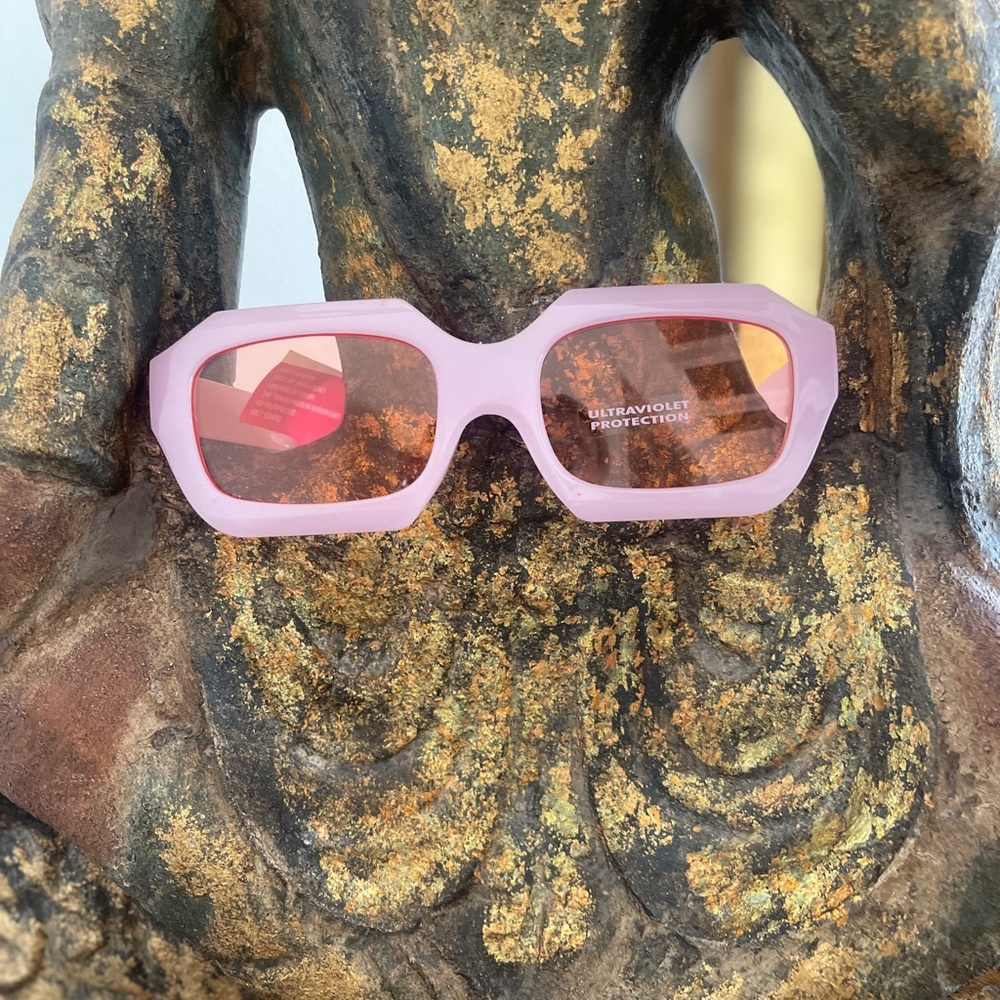 Light pink sunglasses by MCM Designs